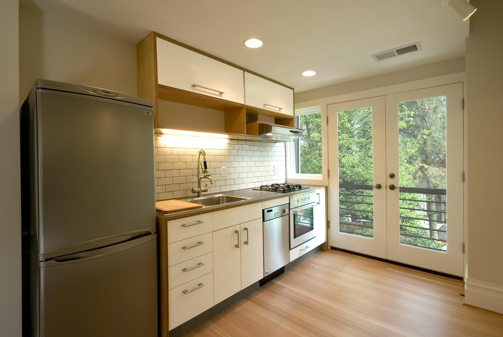 Kitchenette and Balcony in Twin Studios Duplex Conversion